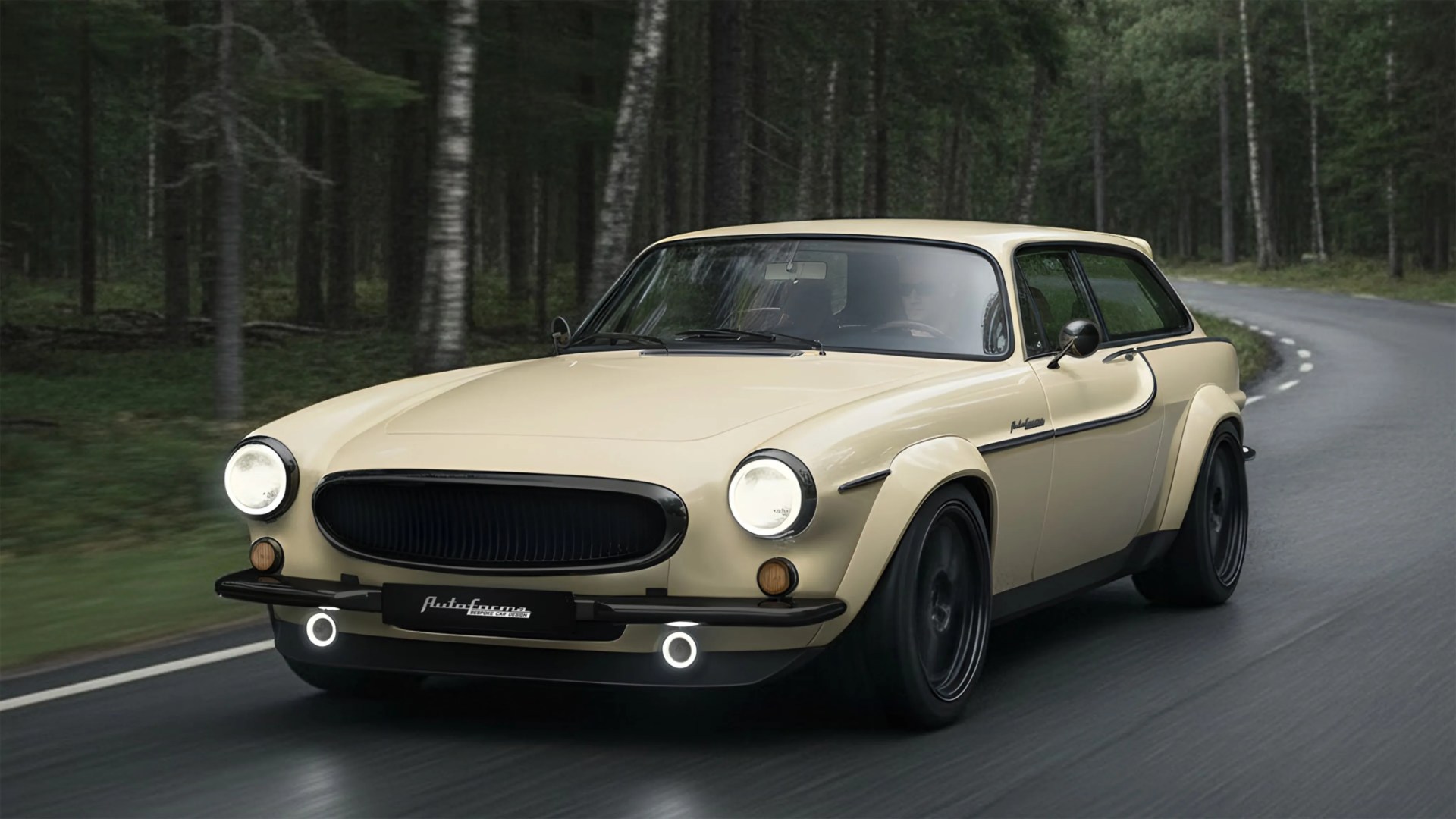 Cream-colored vintage car with black grille and wheels driving on a forest road.