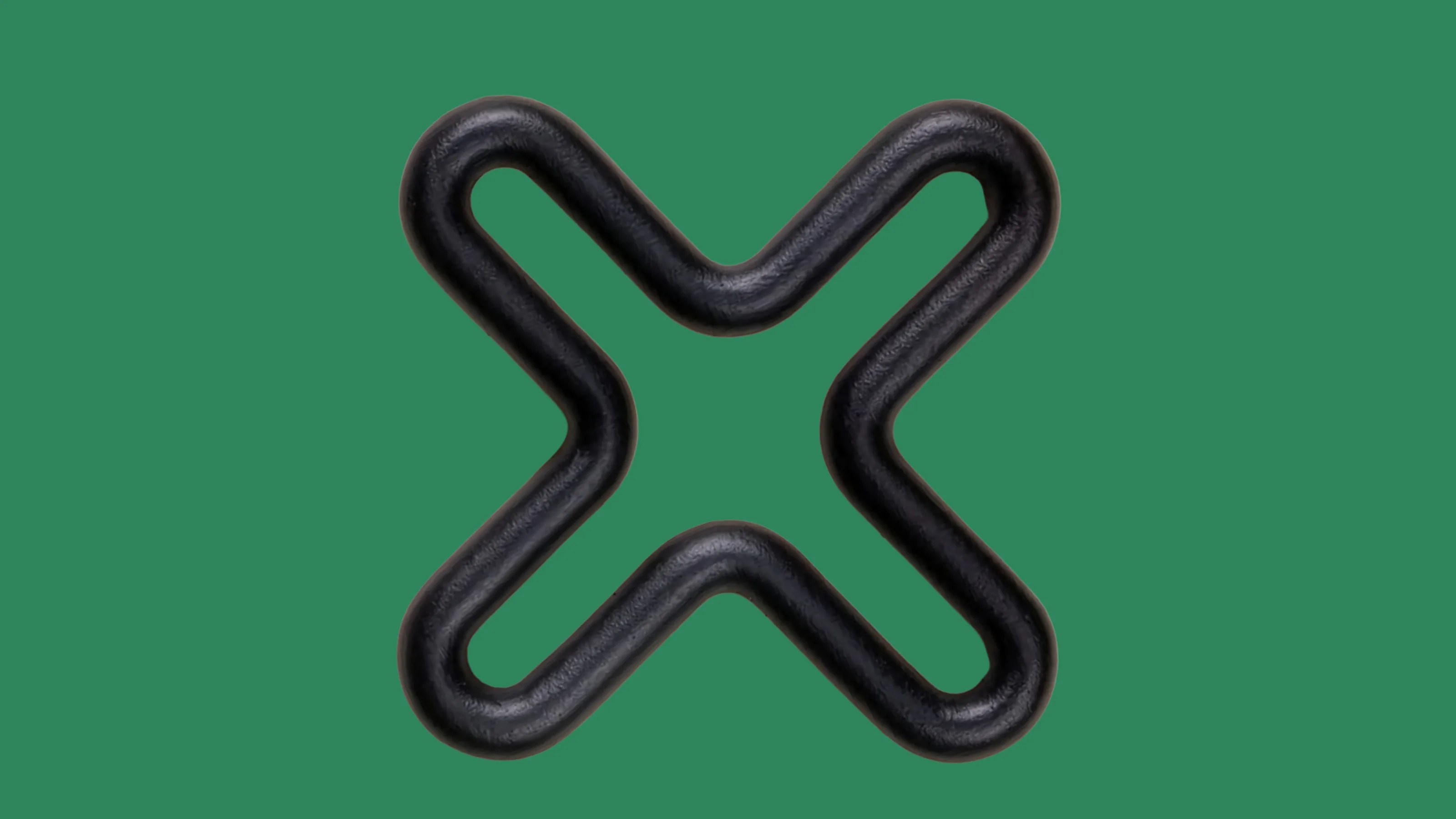 Black rounded X-shaped object with a hollow center on a green background.