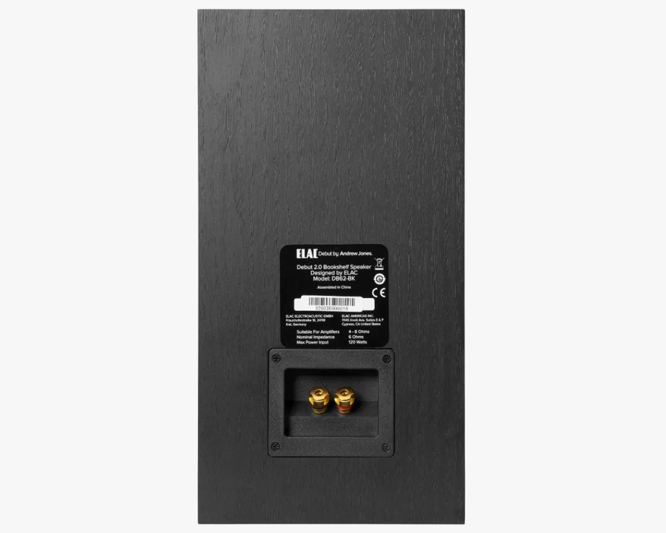 Black wooden bookshelf speaker back panel with gold speaker terminals and a label showing model and specifications.