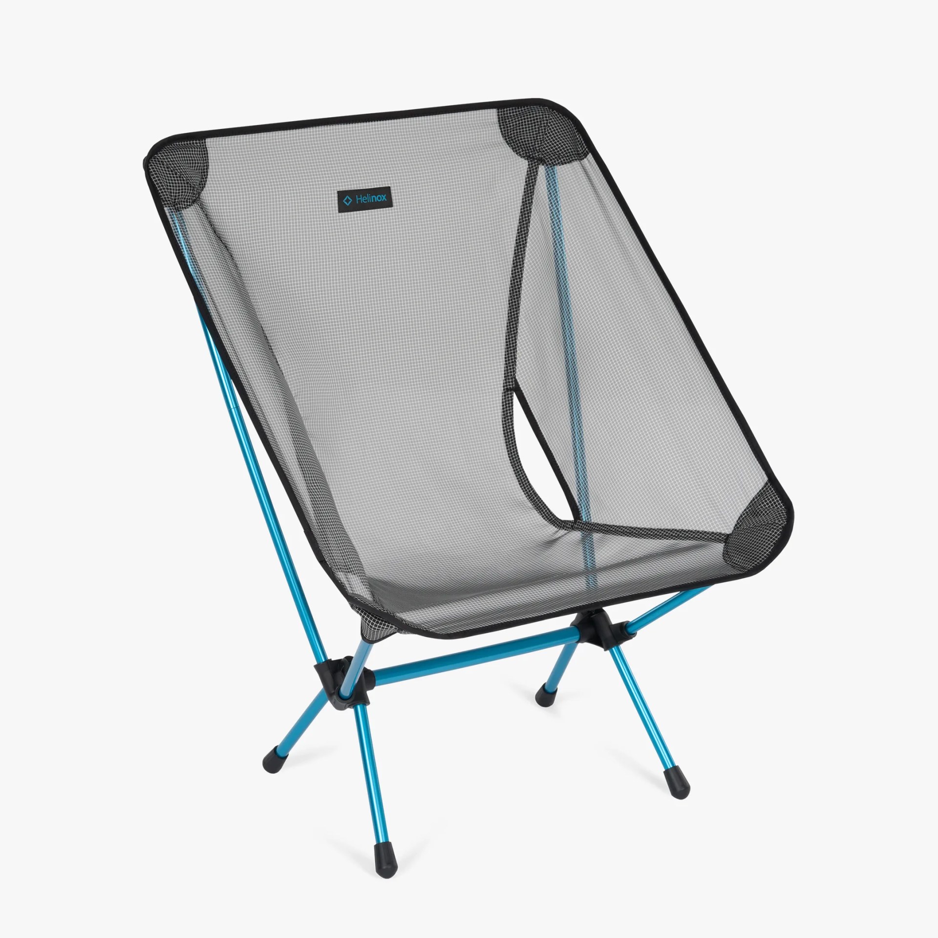 Lightweight black mesh camping chair with blue aluminum frame and black rubber feet.