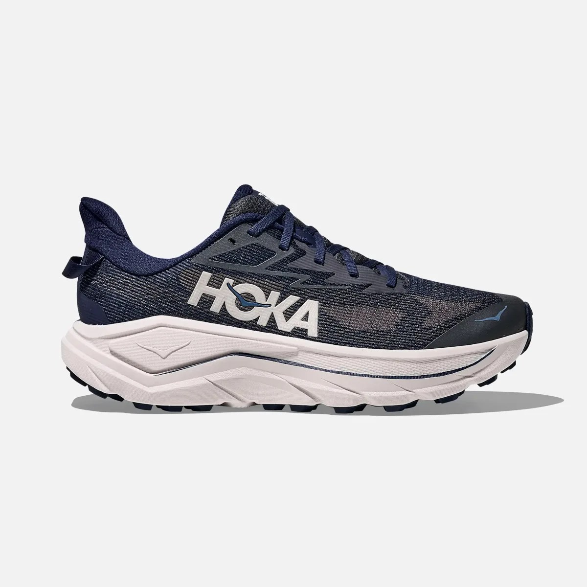 Navy blue Hoka running shoe with white midsole and black outsole shown from the side.