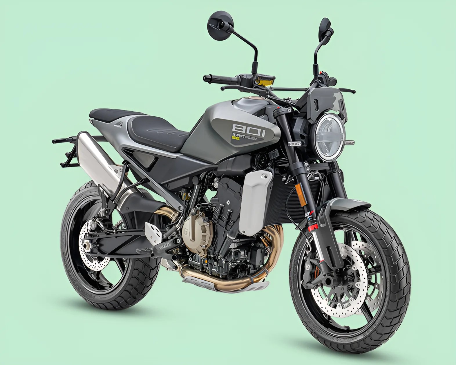 Matte gray and black 801 Scrambler motorcycle with round headlight and dual rearview mirrors on a light green background.