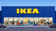 Blue IKEA store facade with large yellow logo and visible interior showing furniture and electronics.