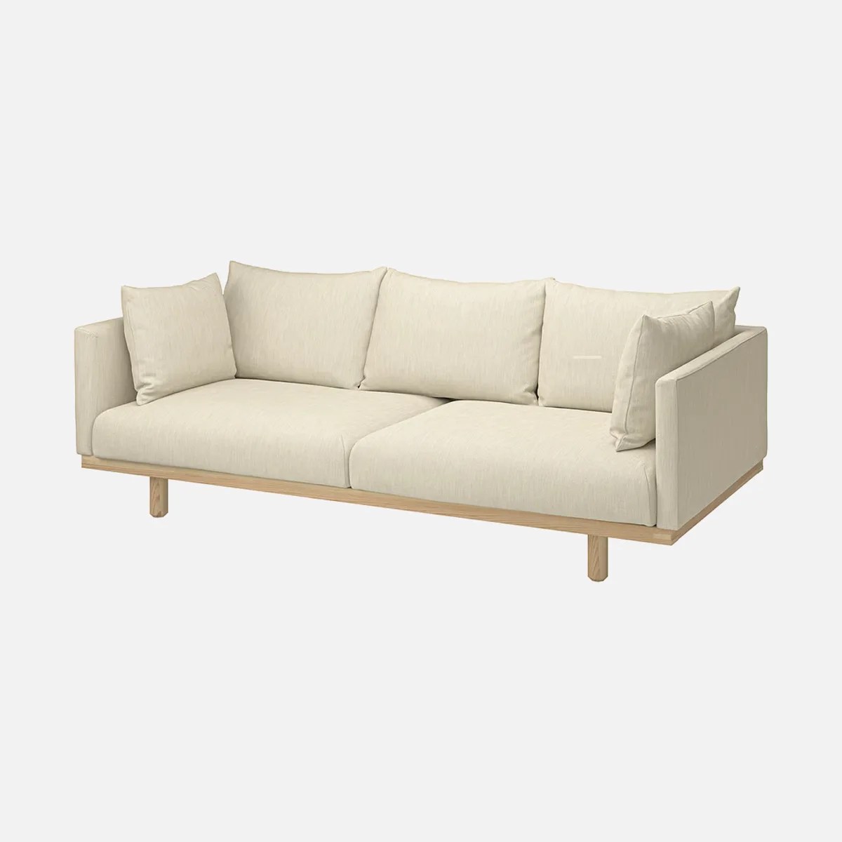 Beige fabric sofa with wooden base and four matching cushions on a white background.