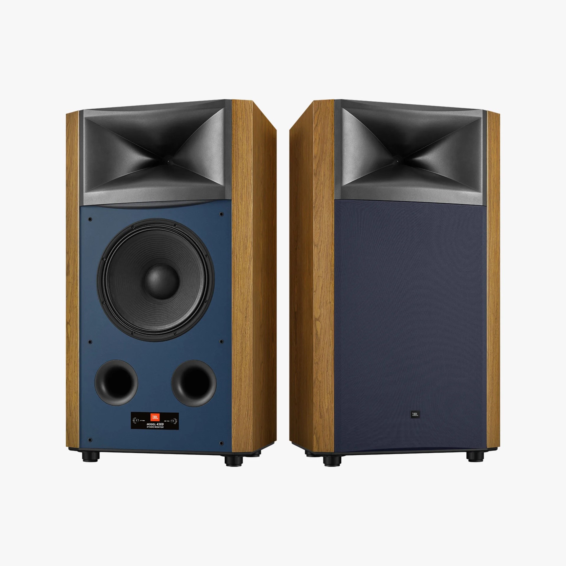 Pair of JBL Model 4369 studio monitor speakers with wood finish and blue front panels, one with grille on.