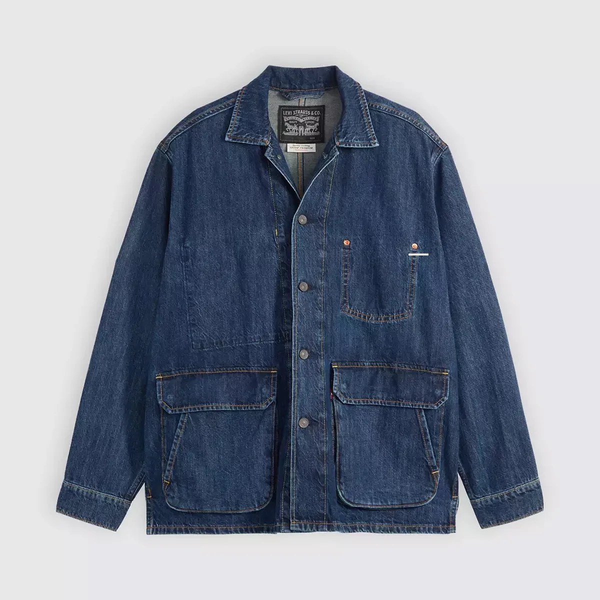 Dark blue denim jacket with button front and three patch pockets on a white background.