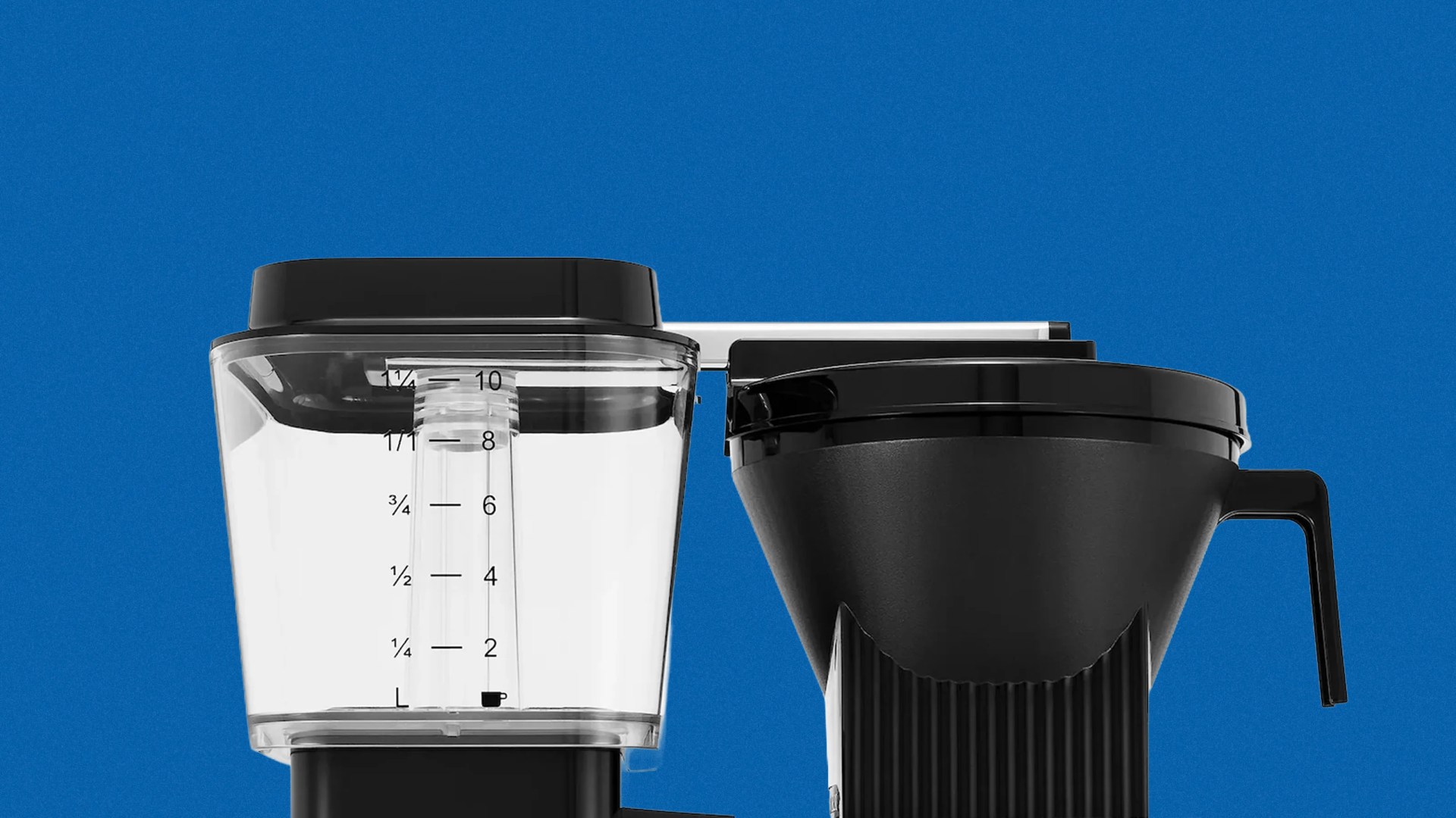 Black and clear plastic coffee maker water reservoir with measurement markings next to a black coffee filter basket with handle.