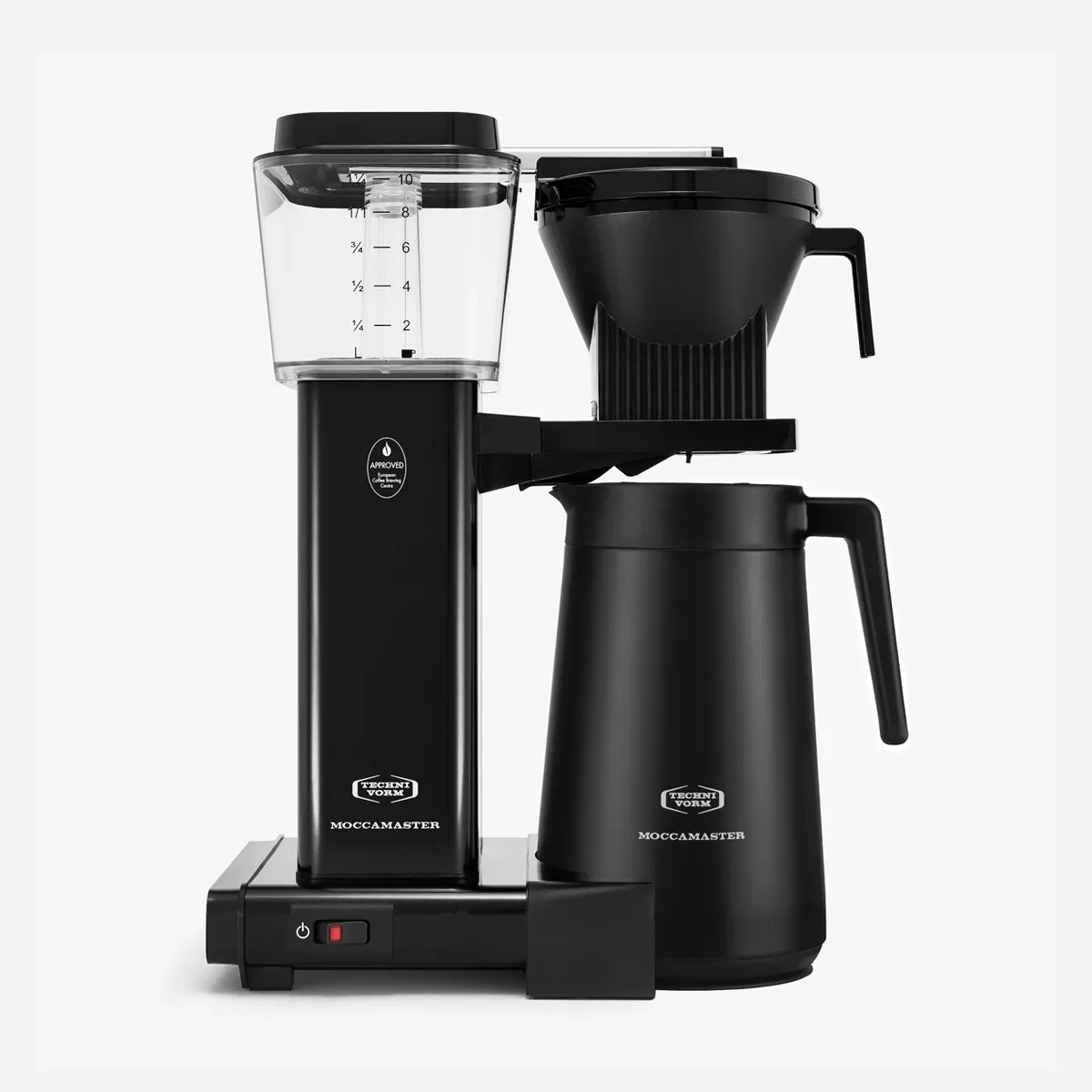 Black Moccamaster drip coffee maker with clear water reservoir and black thermal carafe.