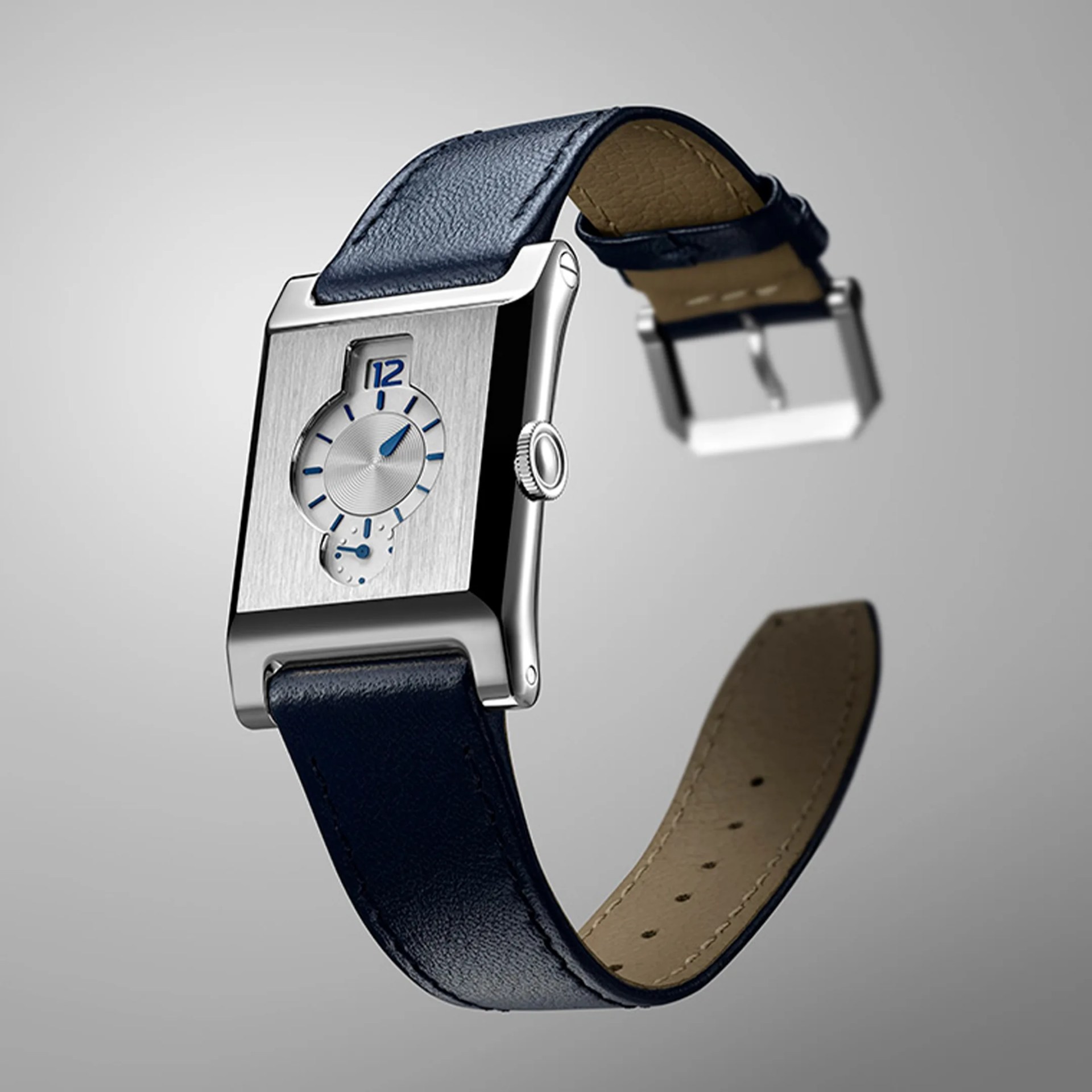 Rectangular silver watch with blue hour markers and hands, paired with a dark blue leather strap.