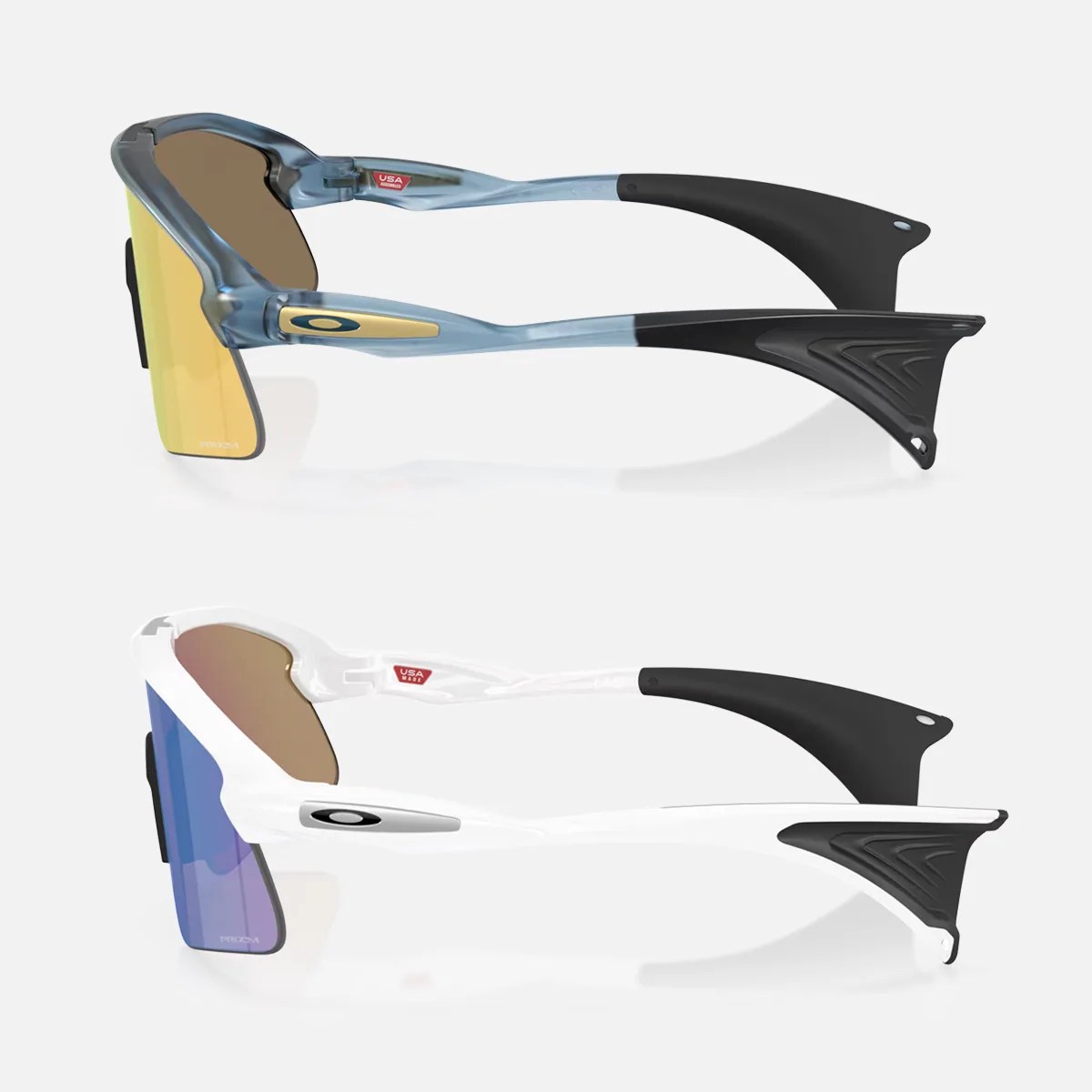 Two pairs of Oakley sports sunglasses, one with a translucent blue frame and yellow lenses, the other with a white frame and blue lenses, both with black temple tips.