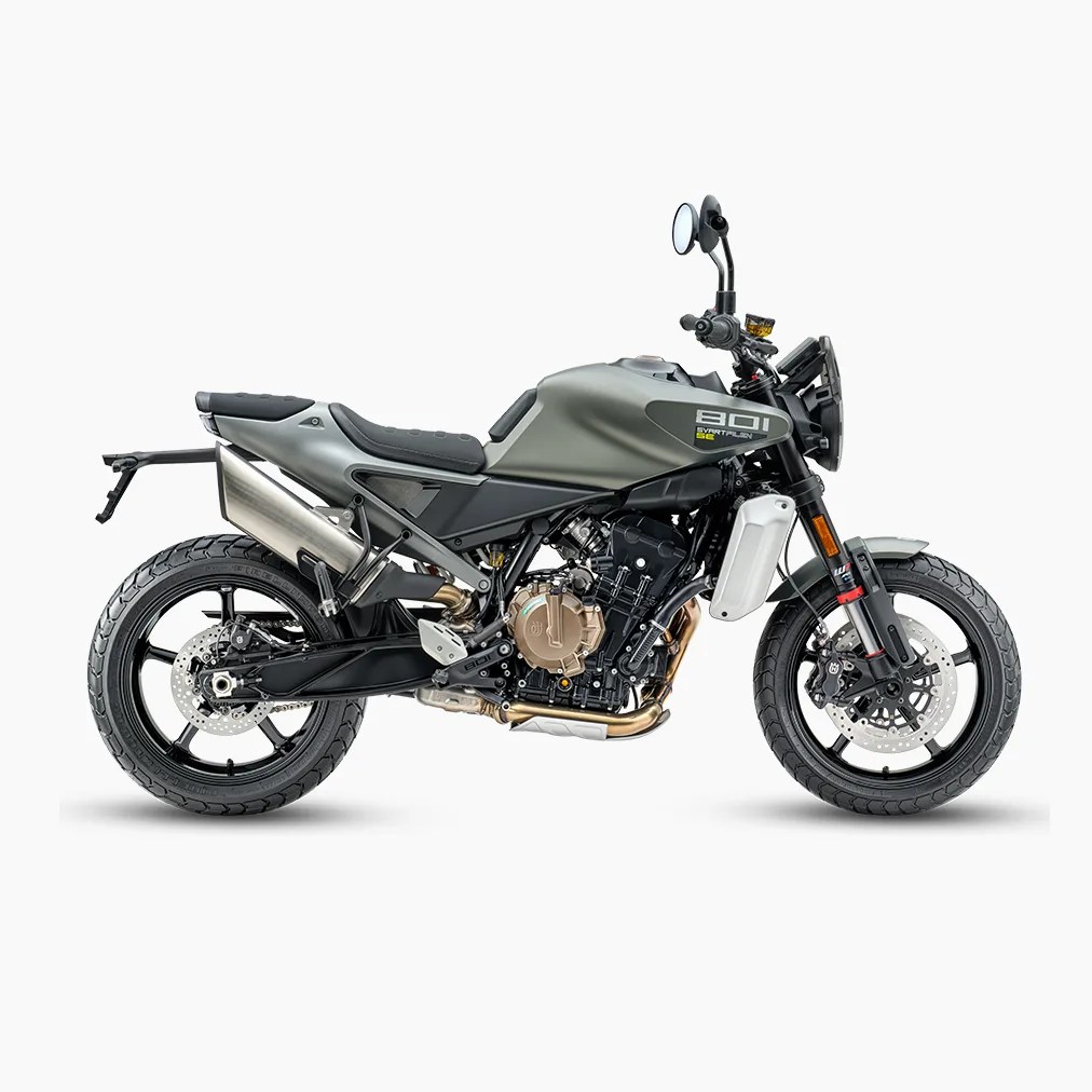 Matte green and black Husqvarna Svartpilen 801 motorcycle with black wheels and silver exhaust on a white background.