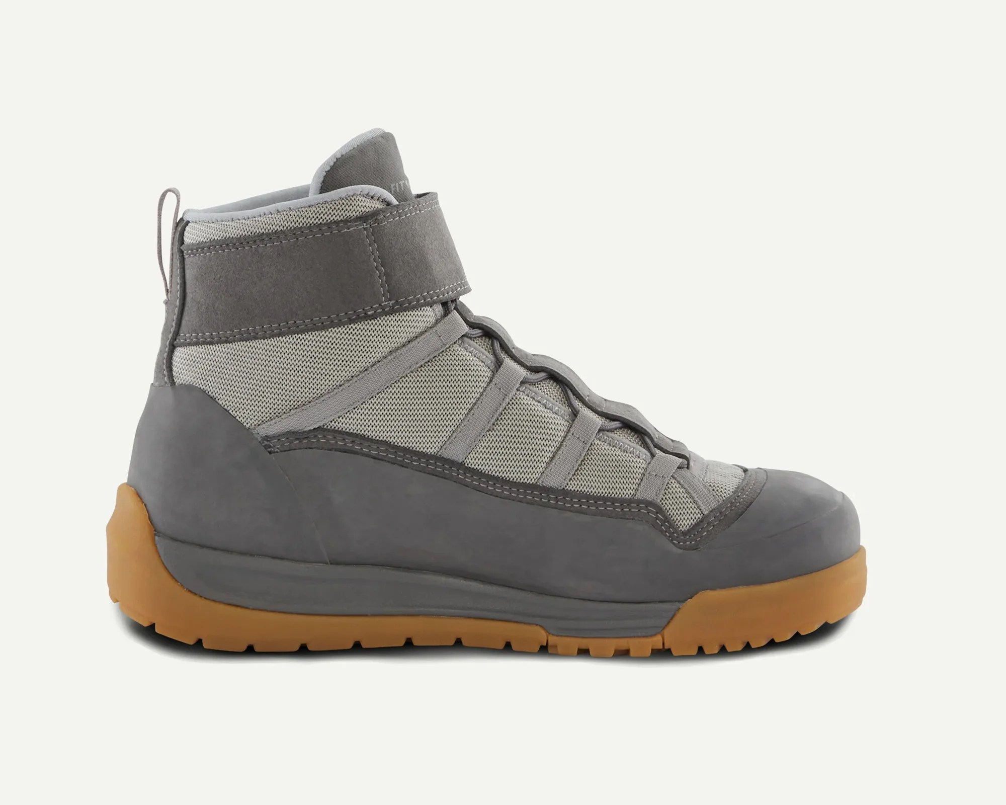 High-top gray sneaker with mesh and suede upper and gum rubber sole.