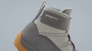 Gray and tan Patagonia hiking boot with mesh and suede upper and rubber sole.