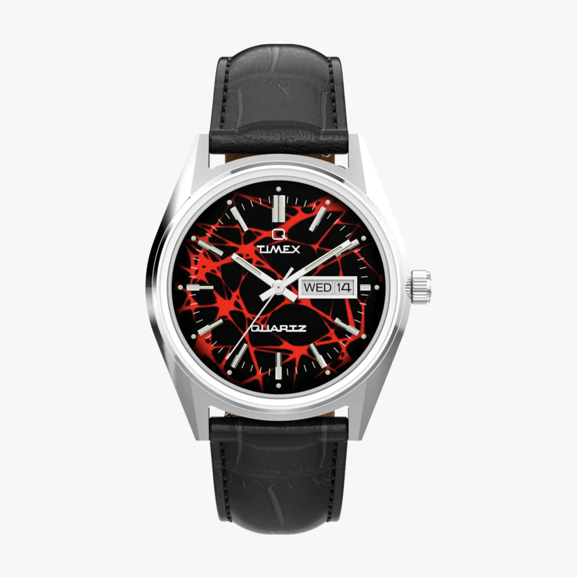 Silver Timex wristwatch with black and red abstract patterned dial and black leather strap.