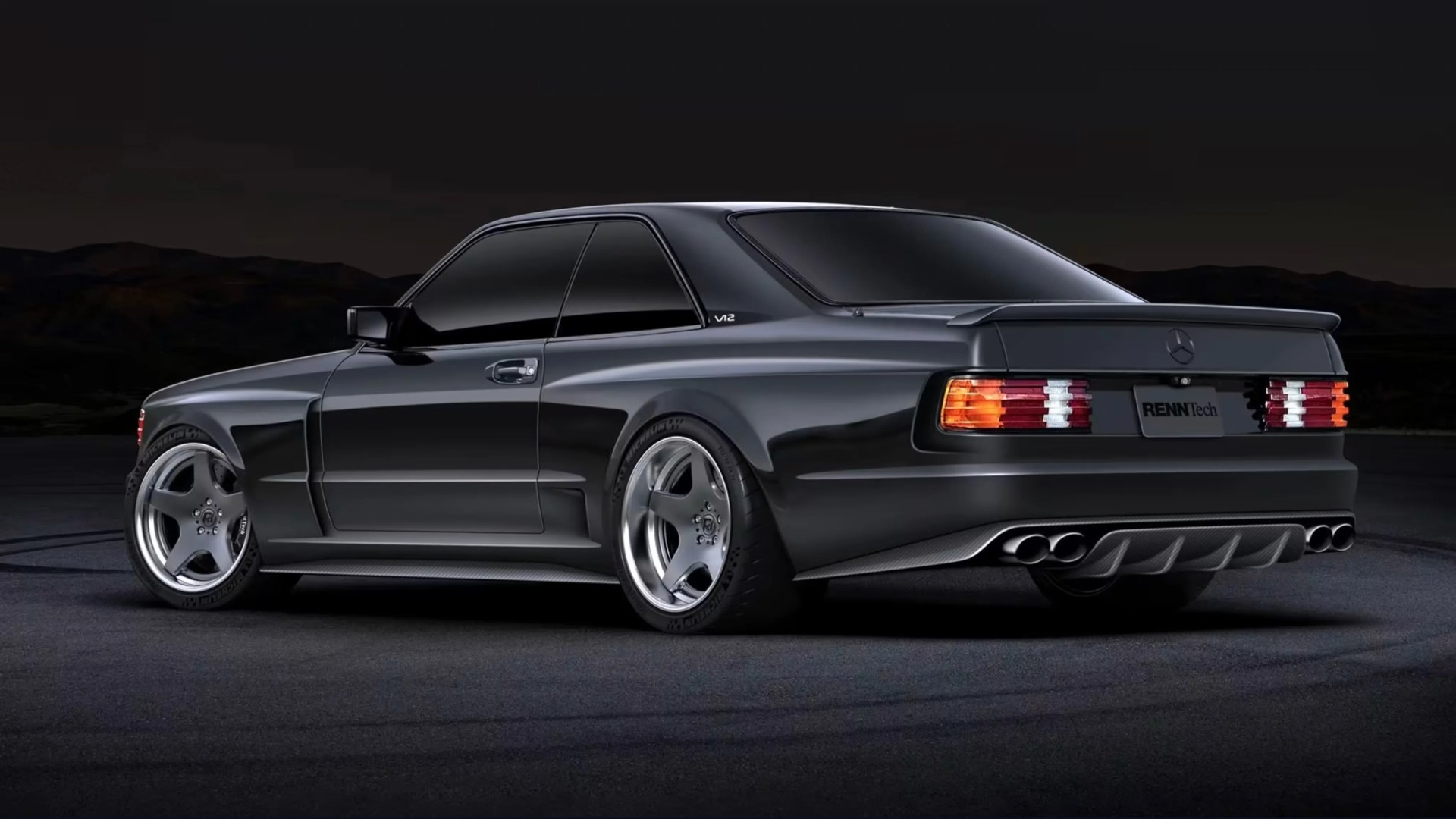 Glossy black Mercedes-Benz coupe with tinted windows, wide body kit, and quad exhaust pipes at rear.