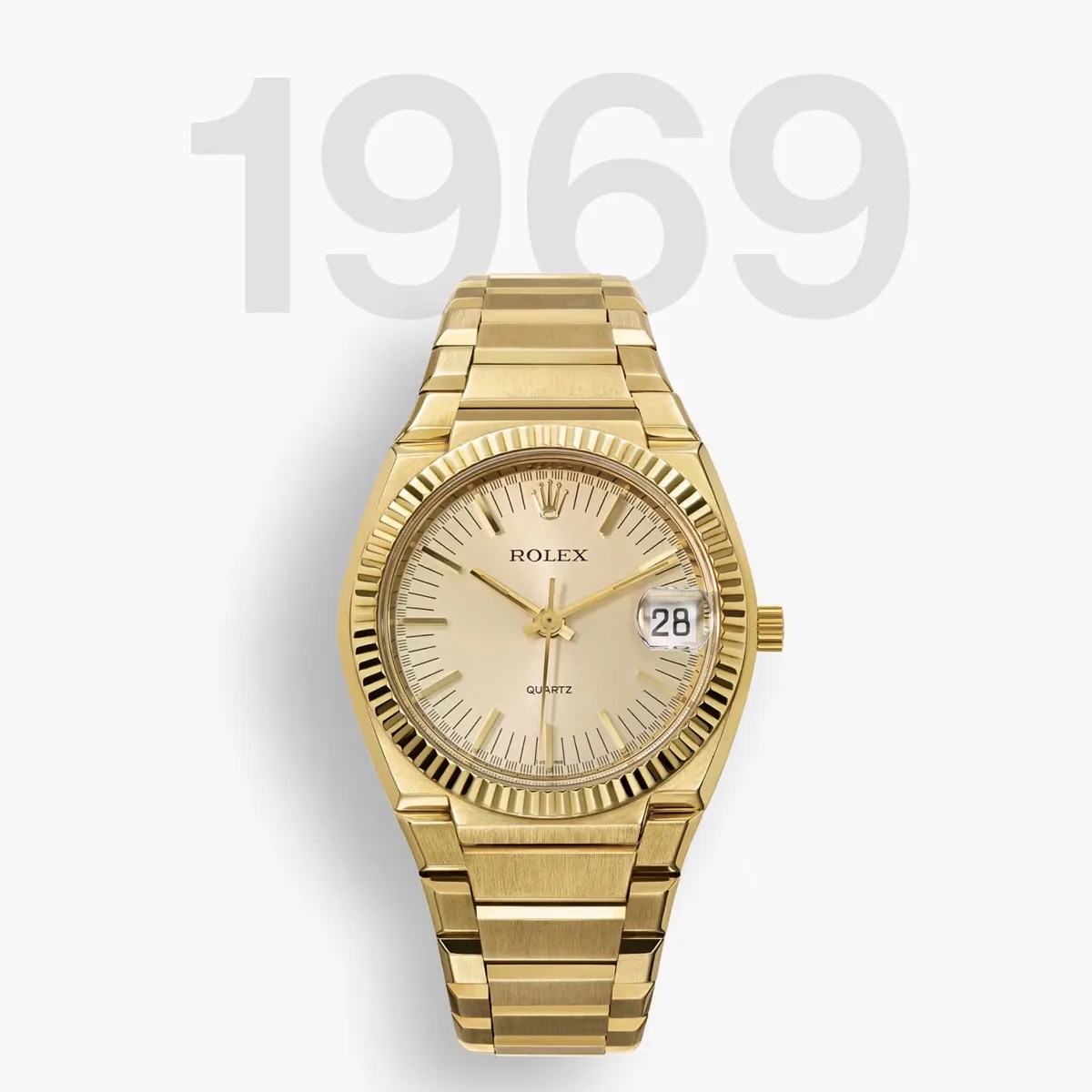 Gold-tone Rolex quartz wristwatch with fluted bezel and date display on a white background.