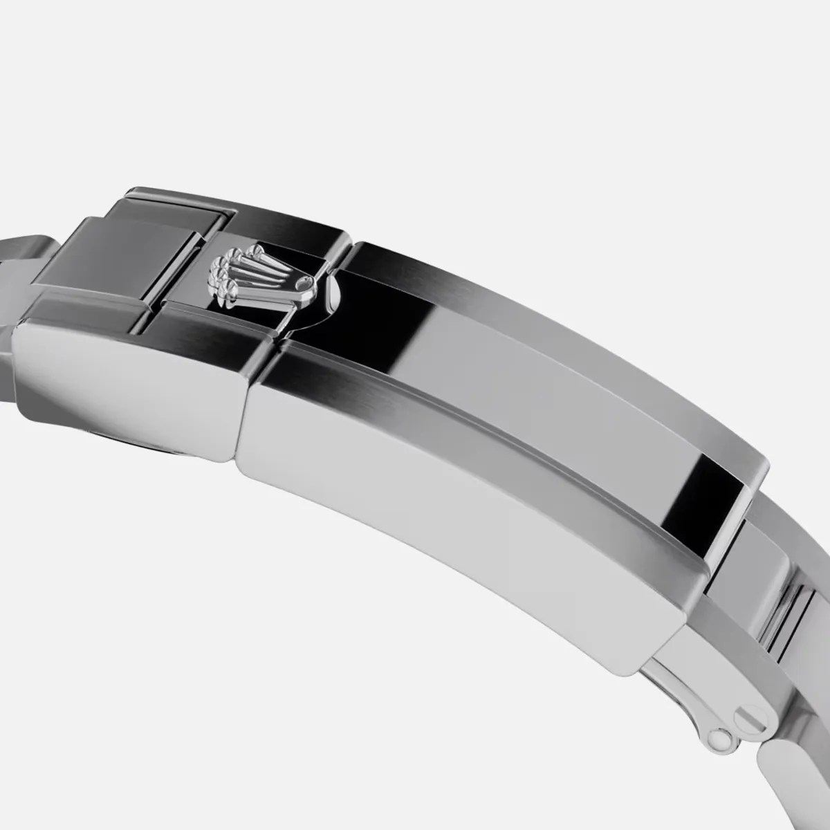 Polished silver metal watch clasp with a raised crown logo on a linked bracelet.