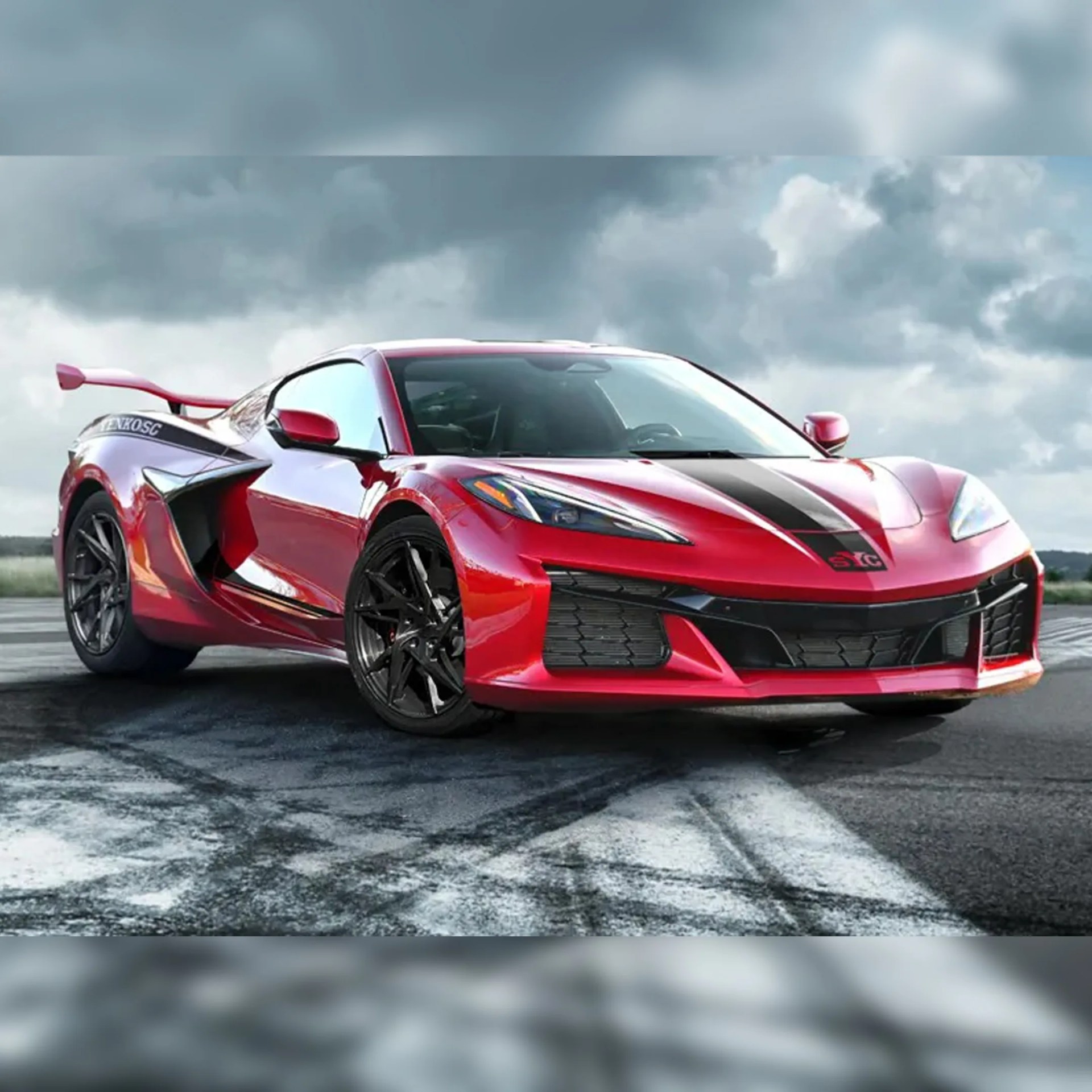 Red sports car with black racing stripe, black wheels, and rear spoiler on asphalt under cloudy sky.