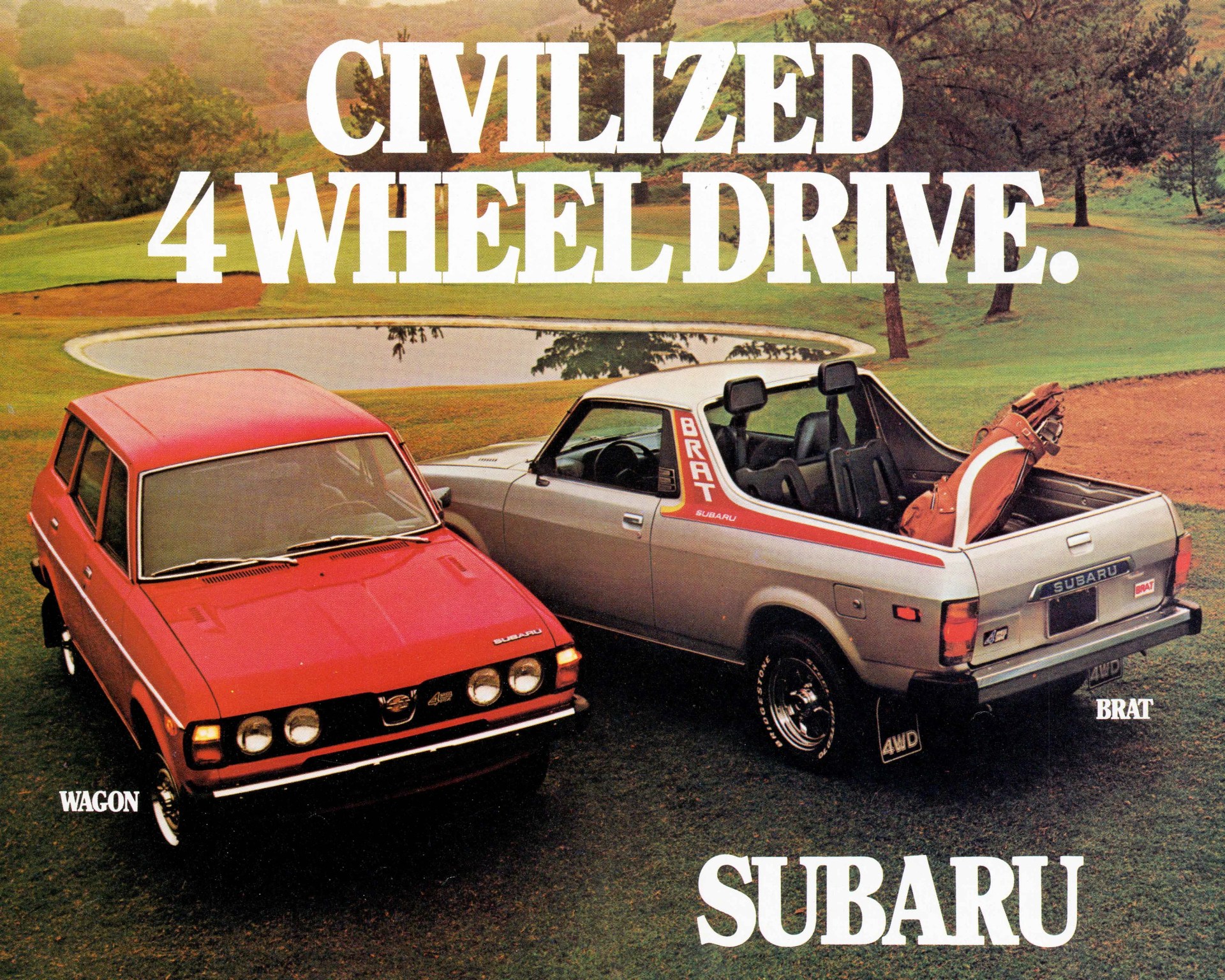 Red Subaru wagon and silver Subaru BRAT pickup truck parked on grass near a pond with golf course in background.