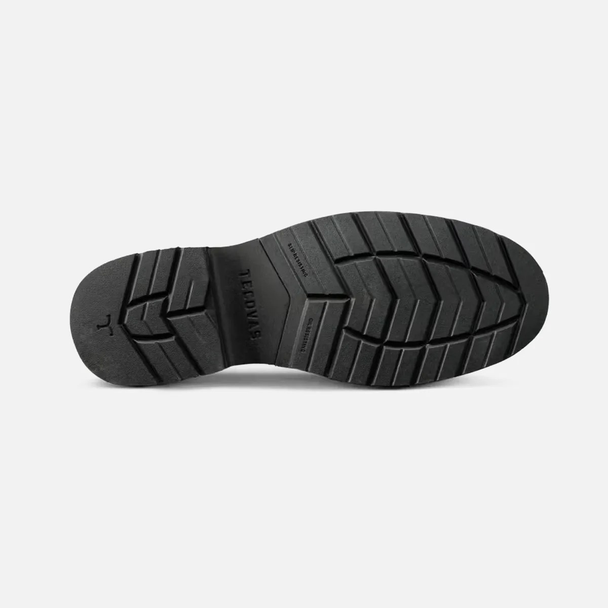 Black rubber shoe sole with deep tread patterns and the brand name "TEODVAS" embossed in the center.