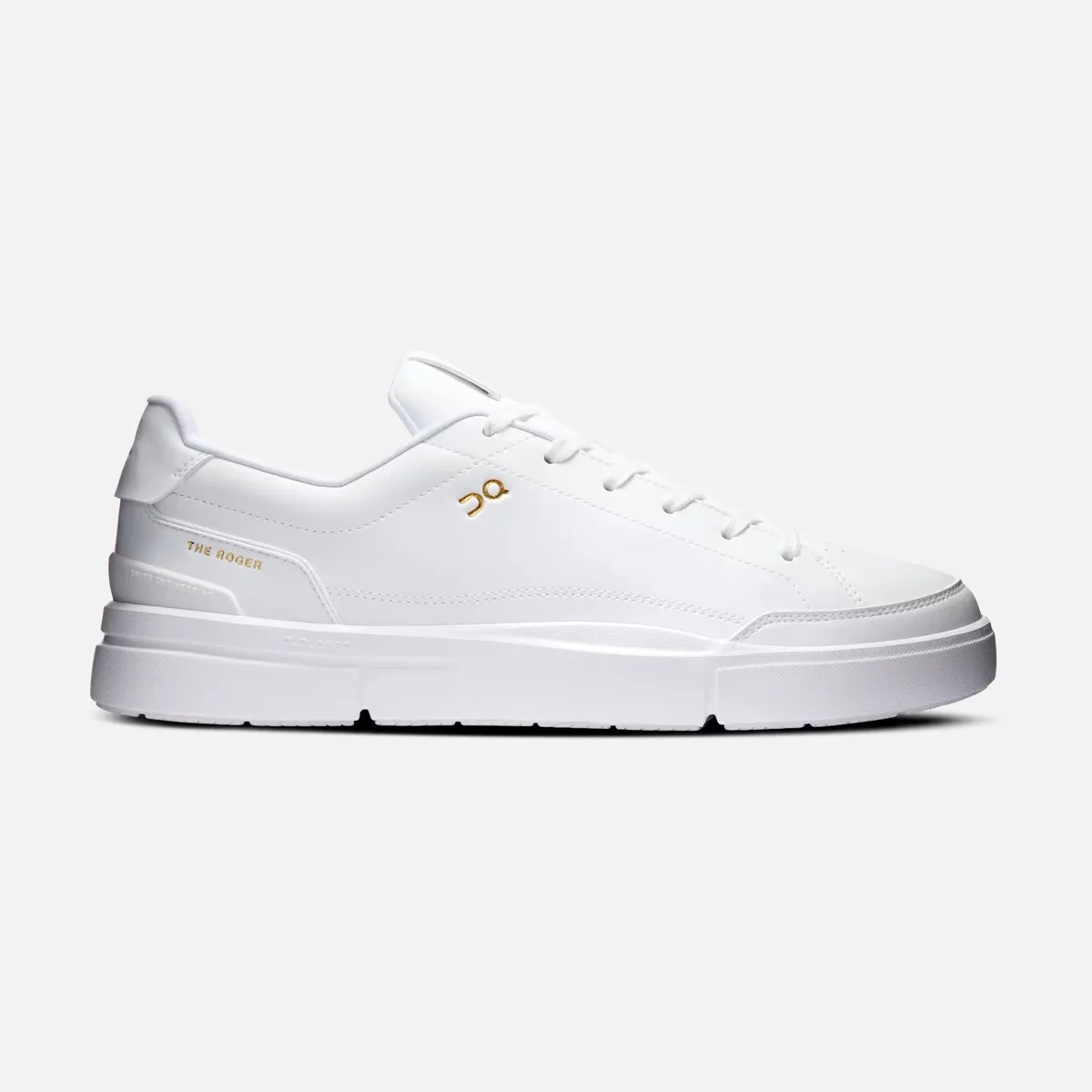 White low-top sneaker with gold "The Roger" text and logo on the side, featuring a thick white sole.