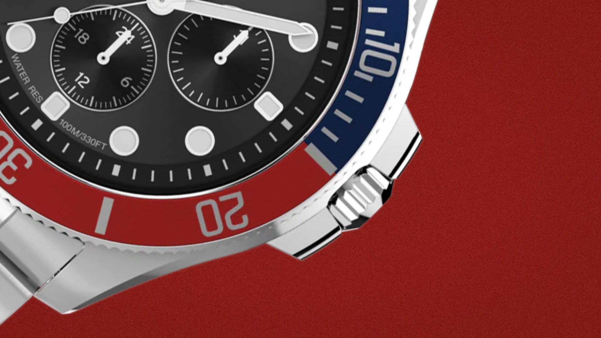 Close-up of a stainless steel watch with a black dial, red and blue bezel, and chronograph subdials.
