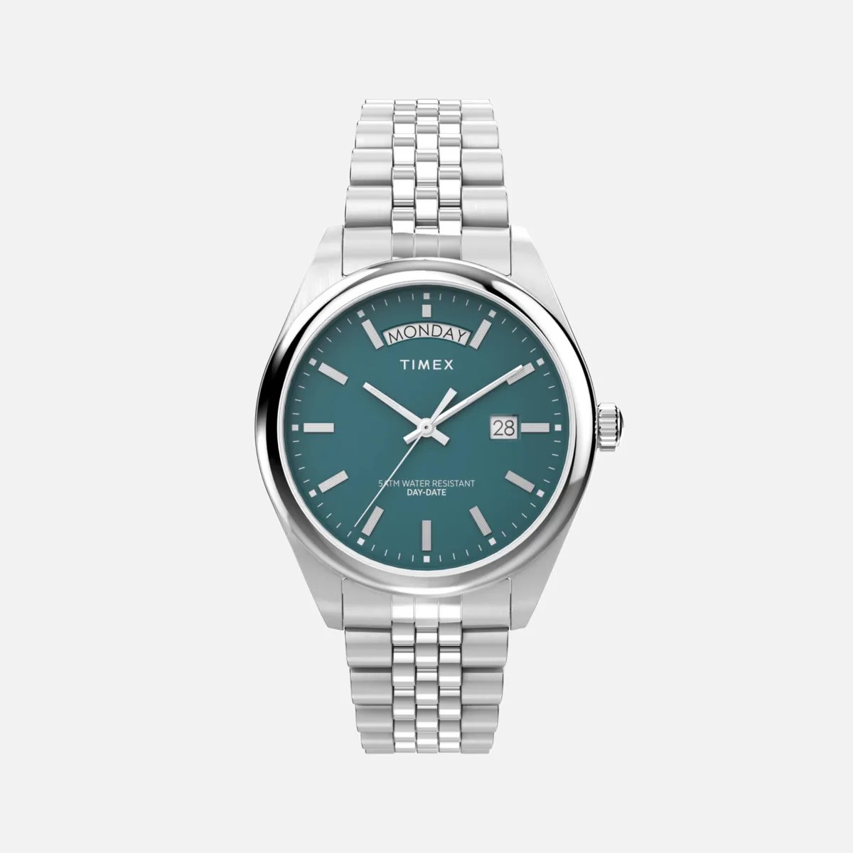 Silver Timex wristwatch with teal dial, day-date display, and metal link bracelet.