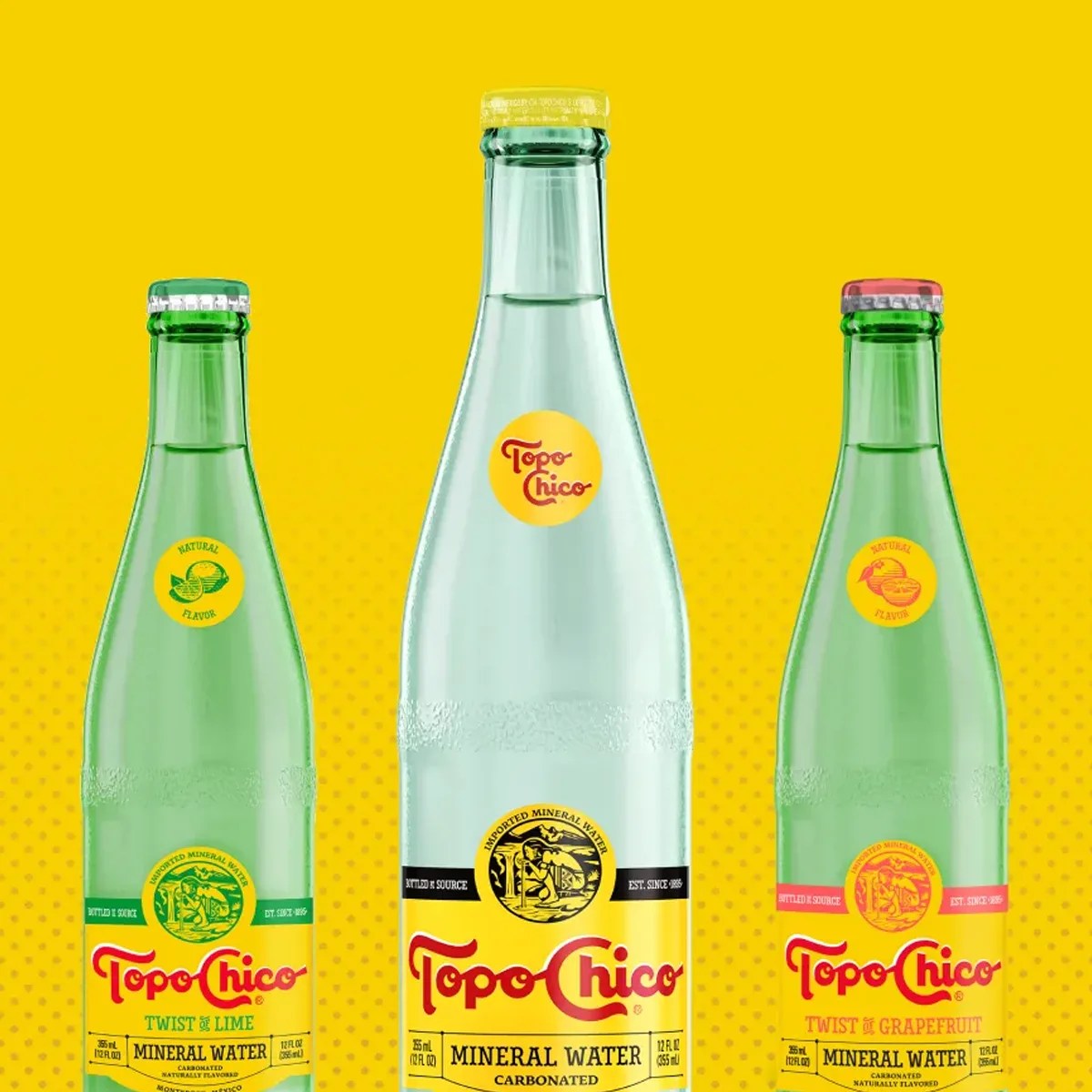 Three green glass bottles of Topo Chico mineral water with yellow labels, featuring Twist of Lime, original, and Twist of Grapefruit flavors, against a yellow background.