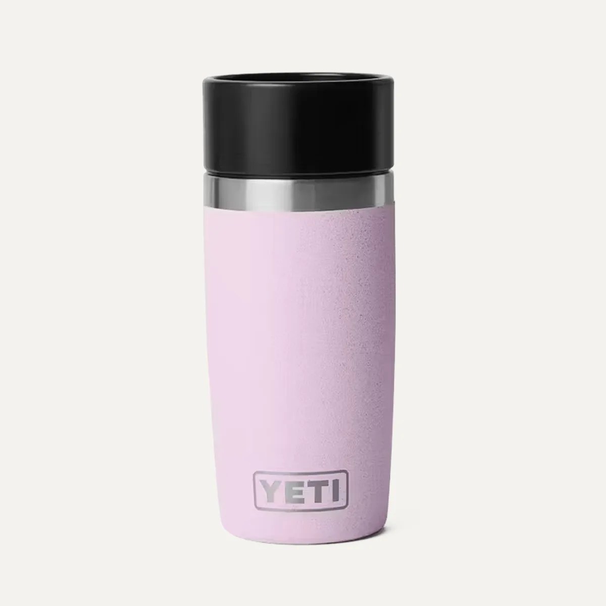 Lavender YETI tumbler with black lid and stainless steel rim on a white background.