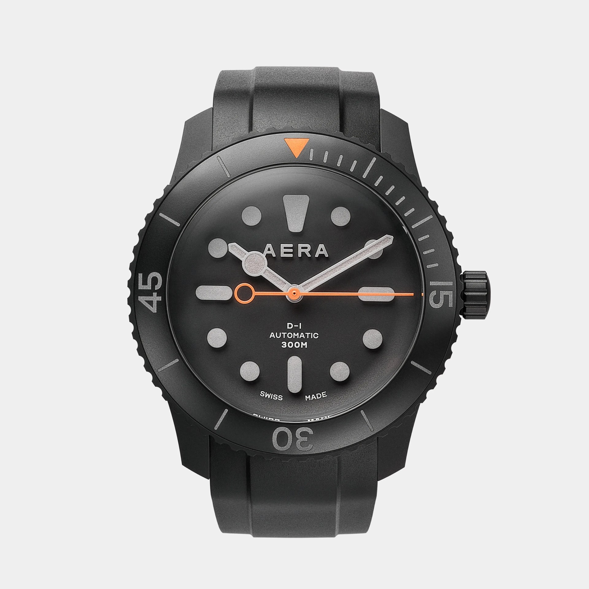 Black AERA dive watch with rubber strap, gray markers, and orange second hand.