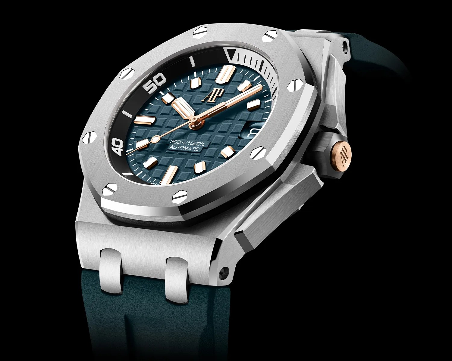 Silver stainless steel wristwatch with a blue textured dial, gold-tone hands, and a dark blue strap.