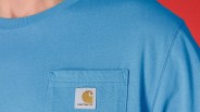 Light blue Carhartt T-shirt with a chest pocket featuring the Carhartt logo patch.