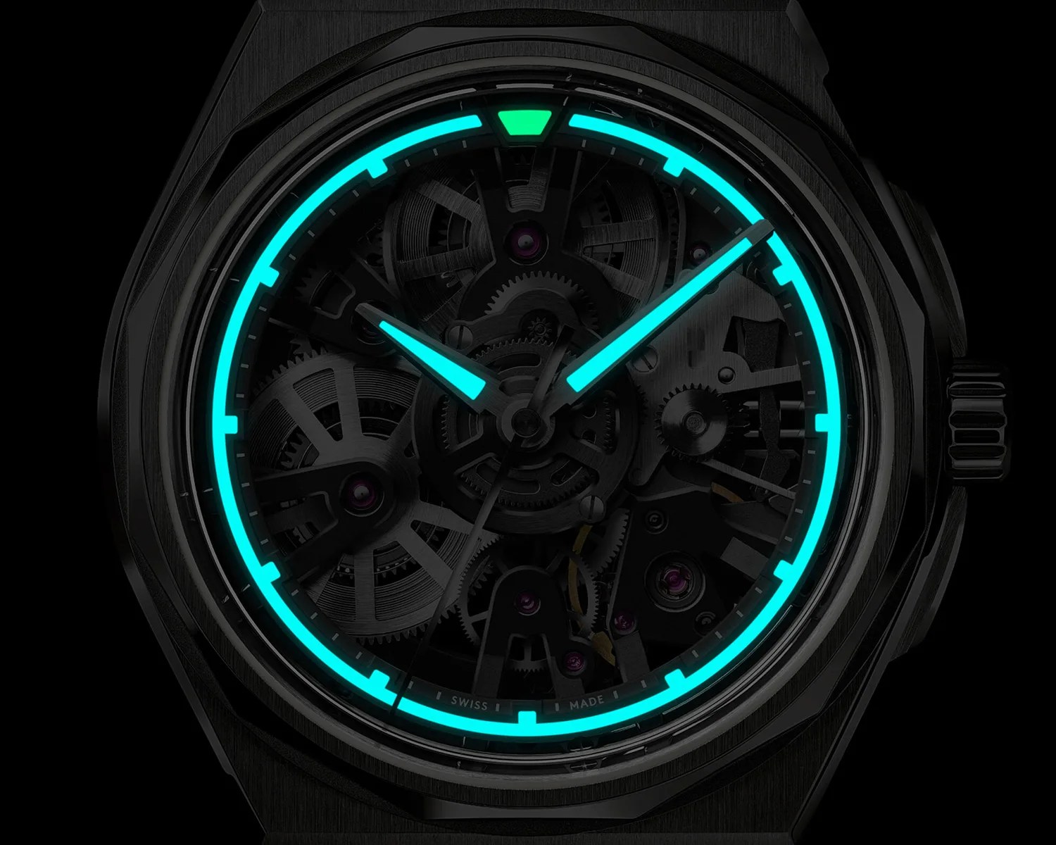 Black skeleton watch face with glowing blue hour markers and hands in a dark setting.