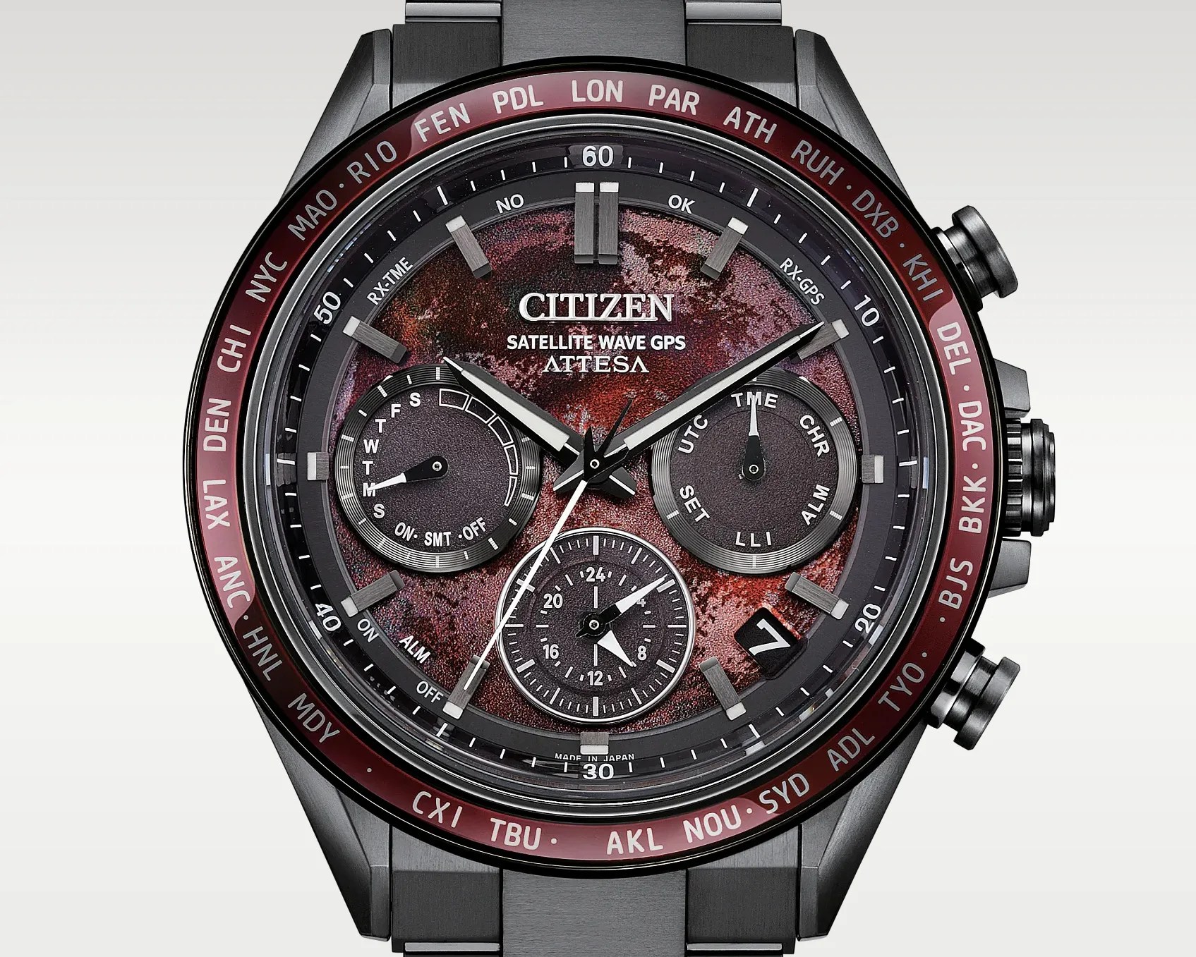 Citizen Attesa Satellite Wave GPS watch with a textured reddish-brown dial, black subdials, and a black metal bracelet.