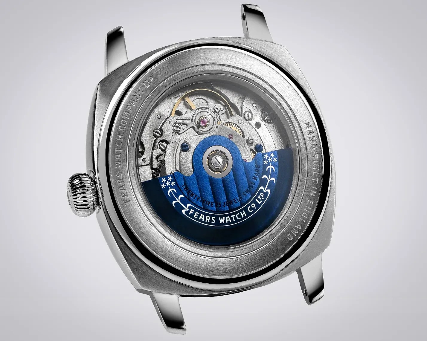 Back view of a stainless steel Fears Watch Co. Ltd with visible mechanical movement and blue rotor.