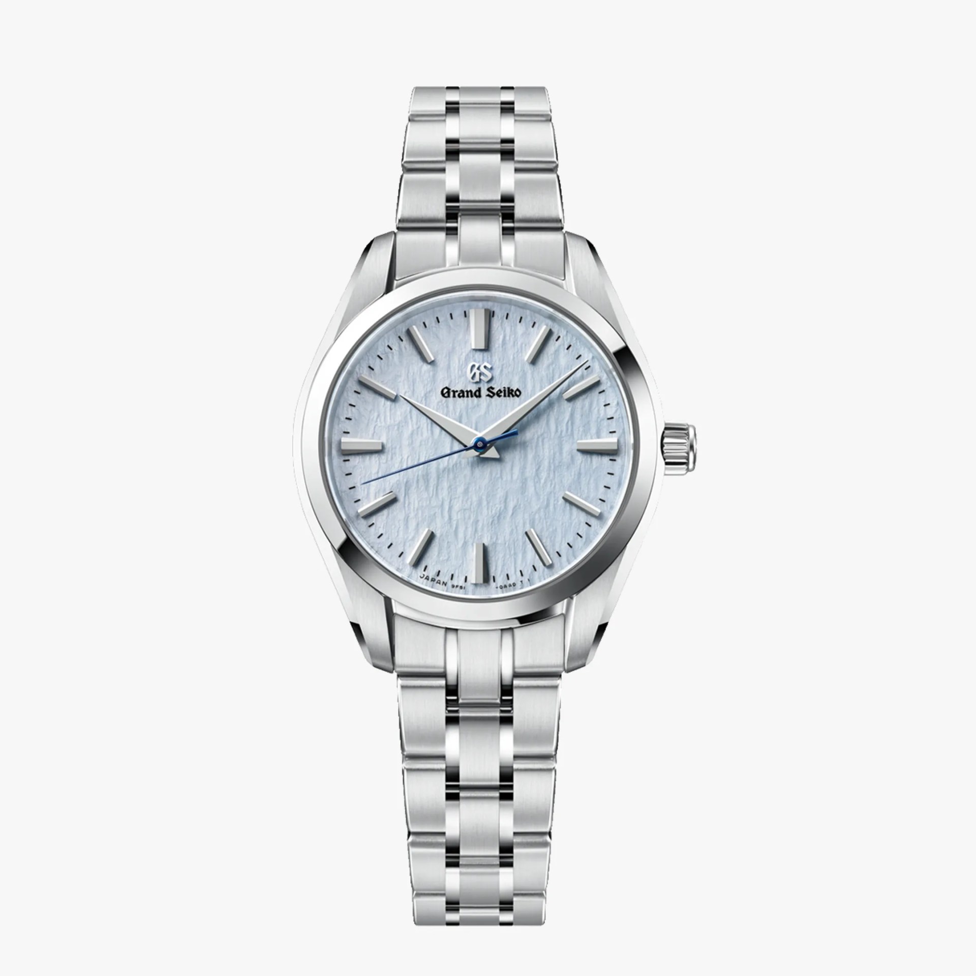 Silver Grand Seiko wristwatch with textured light blue dial and stainless steel bracelet.