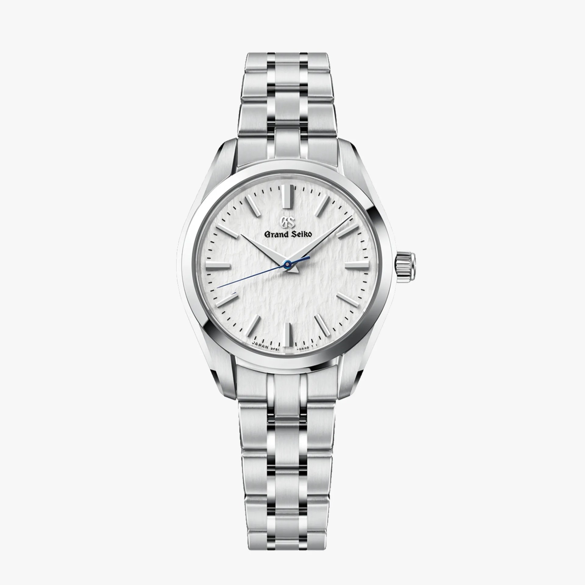 Silver stainless steel Grand Seiko wristwatch with textured white dial and blue second hand.
