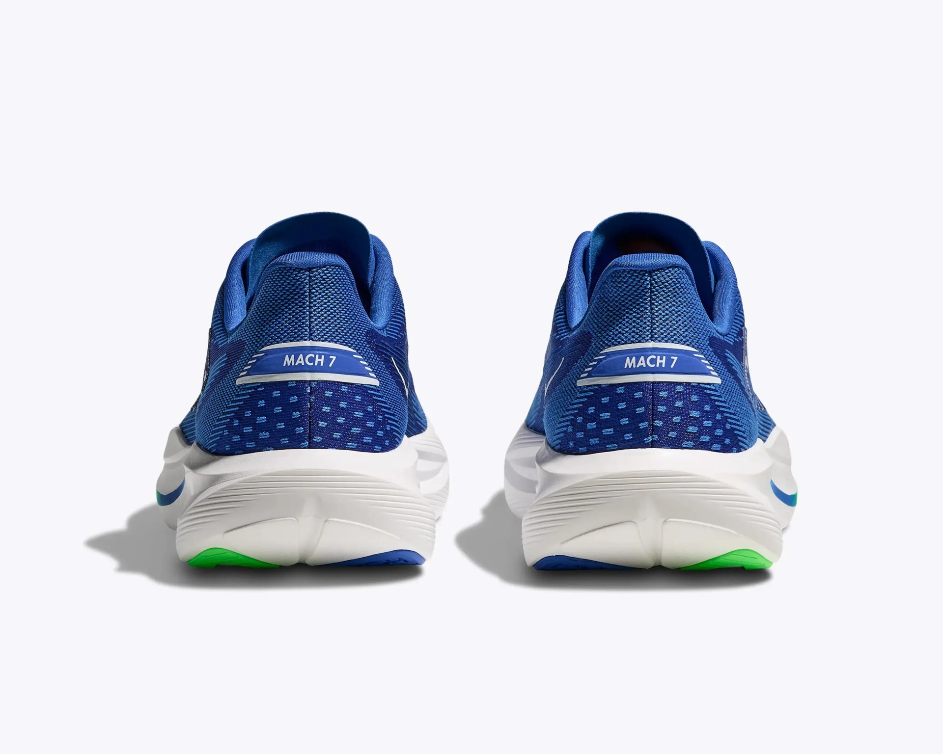 Pair of blue mesh running shoes with white midsoles and green and blue outsole accents, viewed from the back.