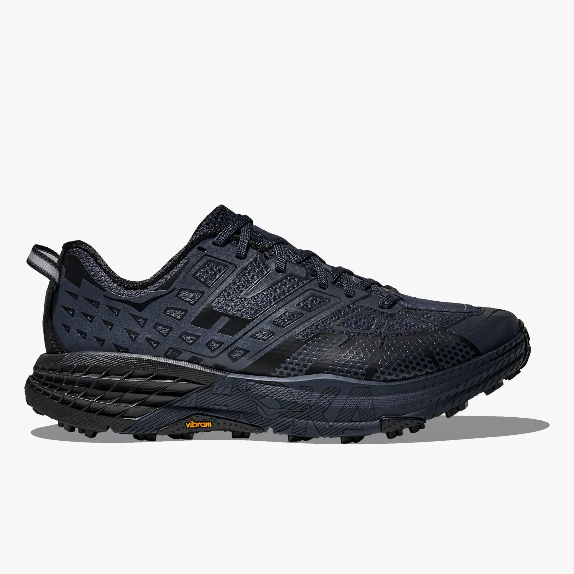 Black and dark gray trail running shoe with mesh upper and Vibram sole.