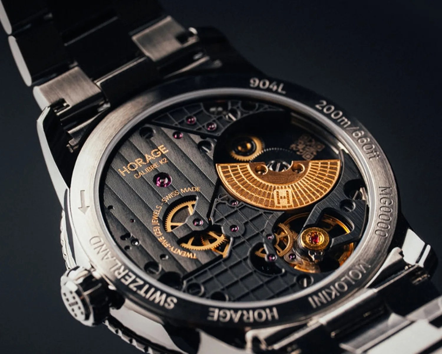 Close-up of the back of a Horage wristwatch showing the intricate mechanical movement with gold and purple details.