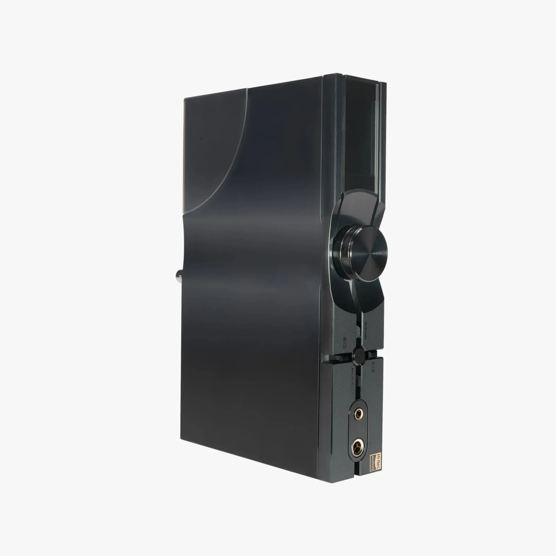 Black rectangular audio amplifier with a large volume knob and two headphone jacks on the front panel.