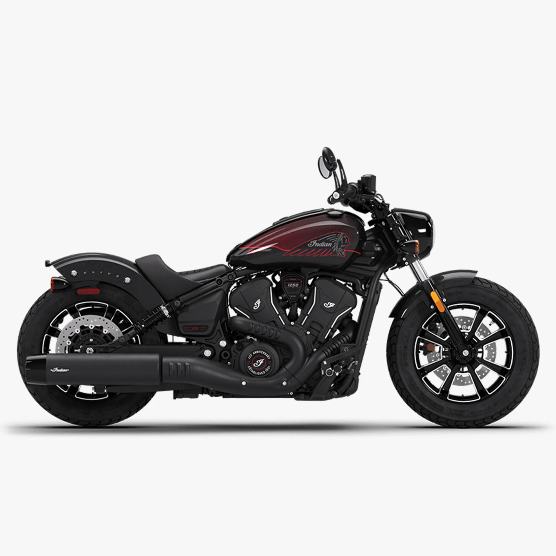 Black and dark red Indian motorcycle with V-twin engine and black exhaust system on a white background.