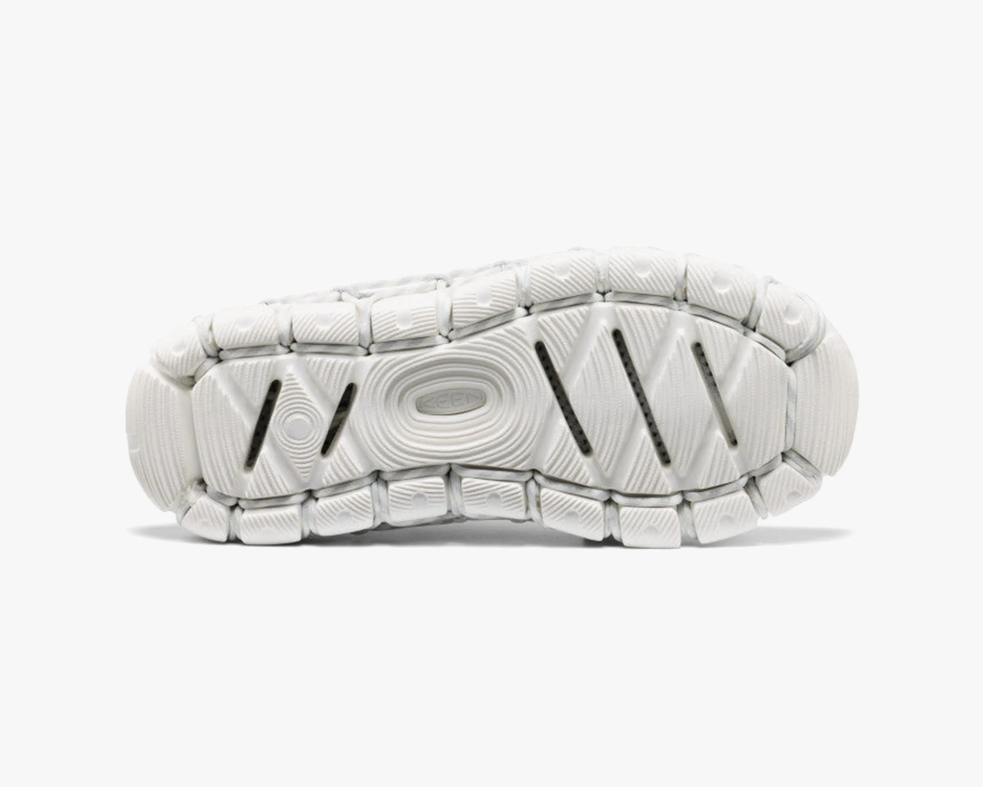 White segmented rubber outsole with textured grip and "KEEN" logo in the center.