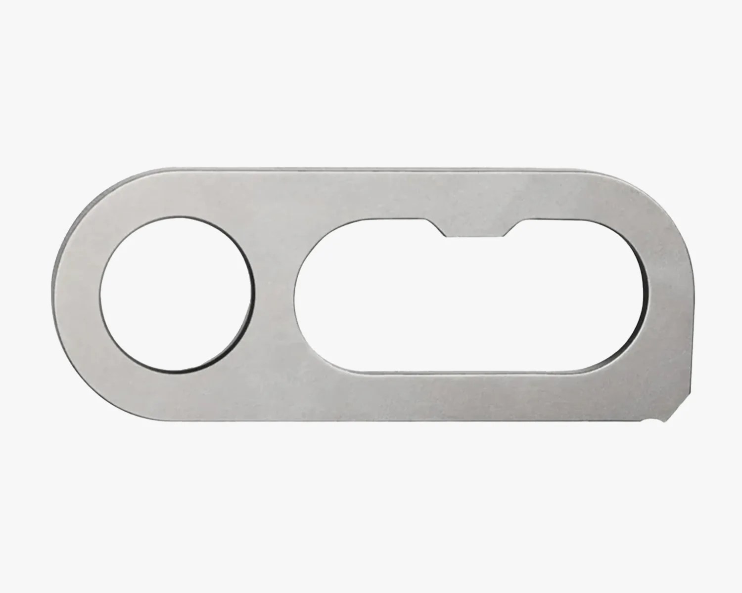 Flat silver metal tool with a circular hole on one end and an elongated oval cutout on the other.