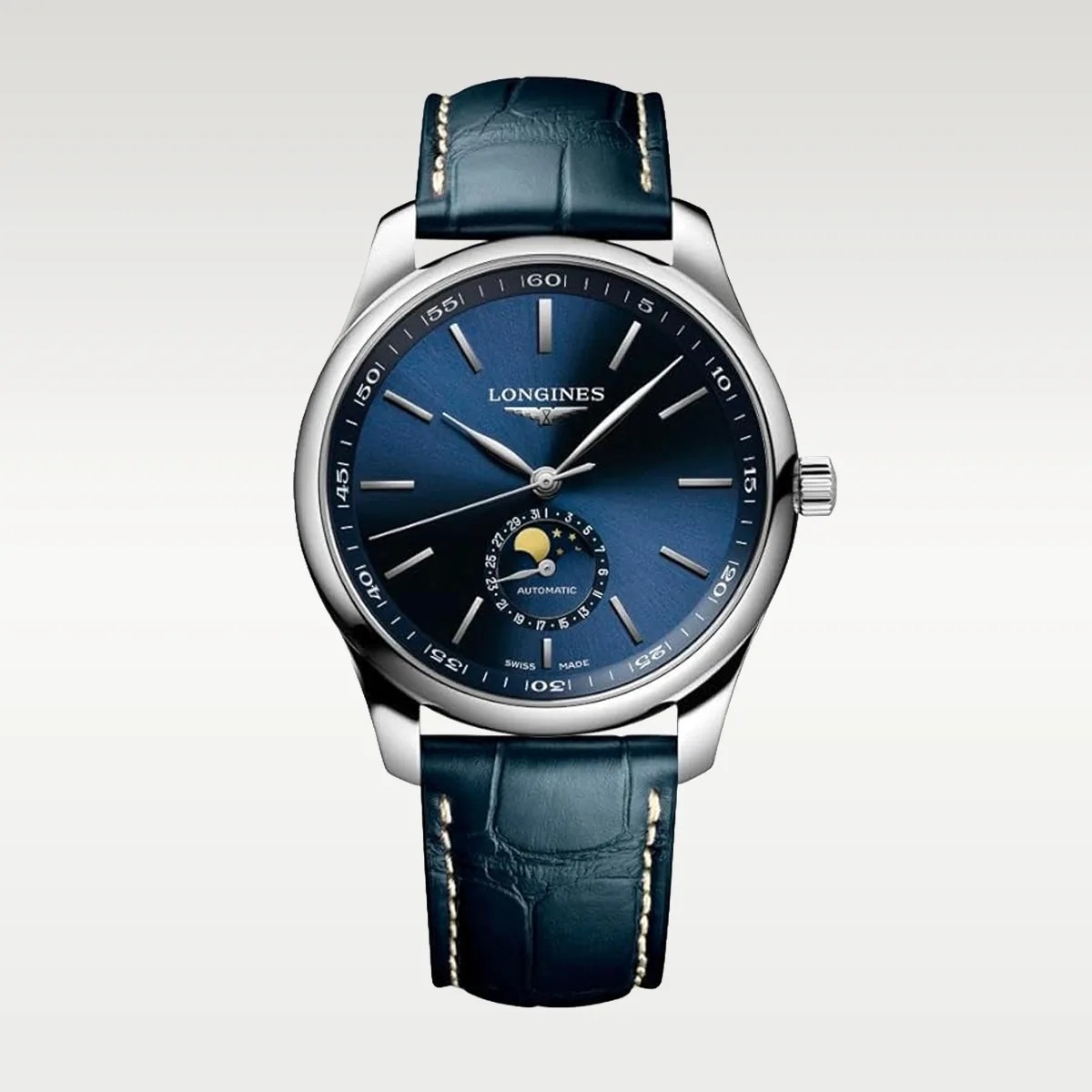 Silver Longines wristwatch with blue sunburst dial, moon phase subdial, and blue leather strap with white stitching.