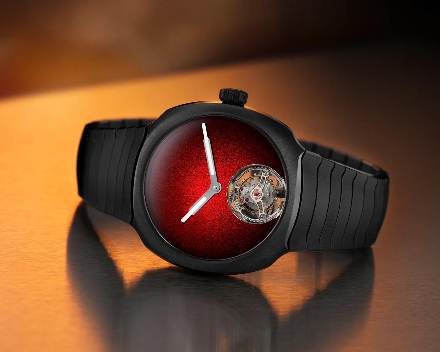 Black wristwatch with a textured deep red dial and visible tourbillon mechanism on a reflective surface.