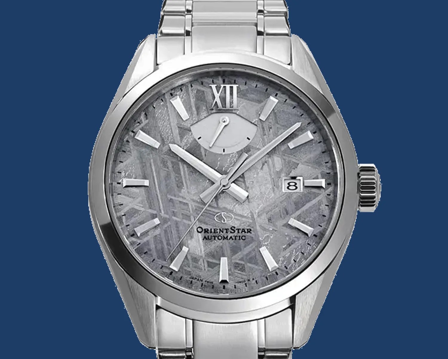 Silver Orient Star automatic wristwatch with textured gray dial, date window at 3 o'clock, and stainless steel bracelet.