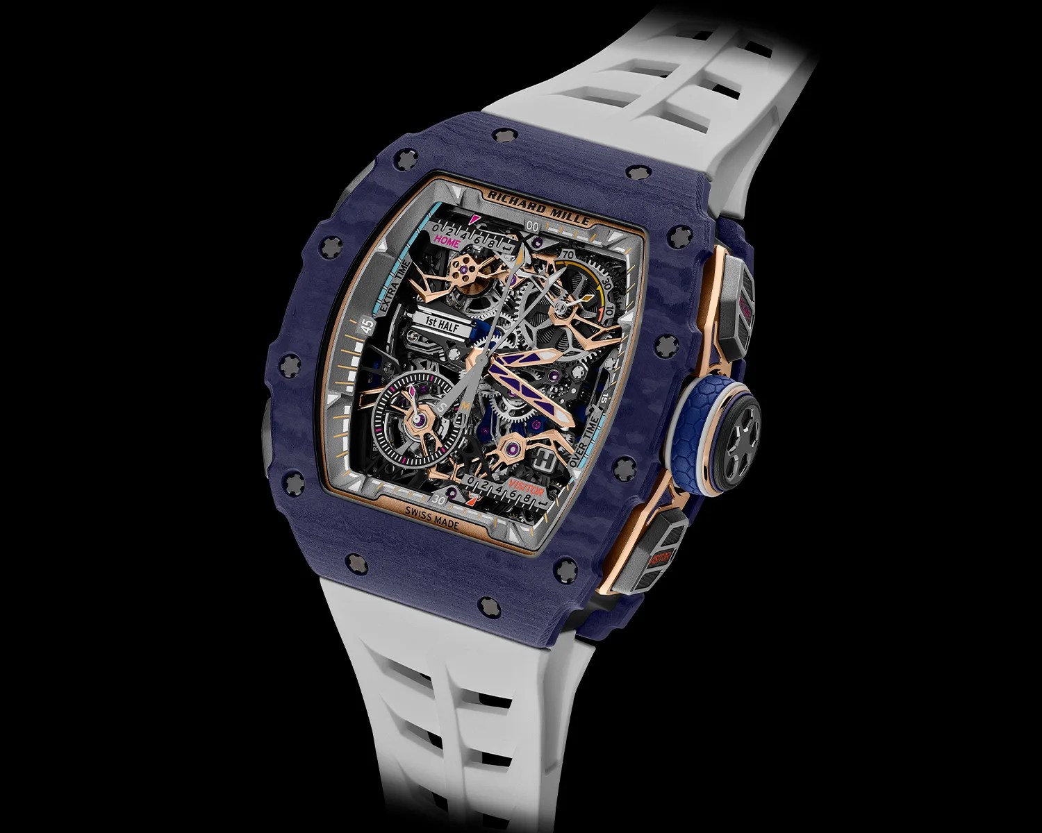 Skeleton dial Richard Mille watch with blue case, rose gold accents, and white rubber strap.