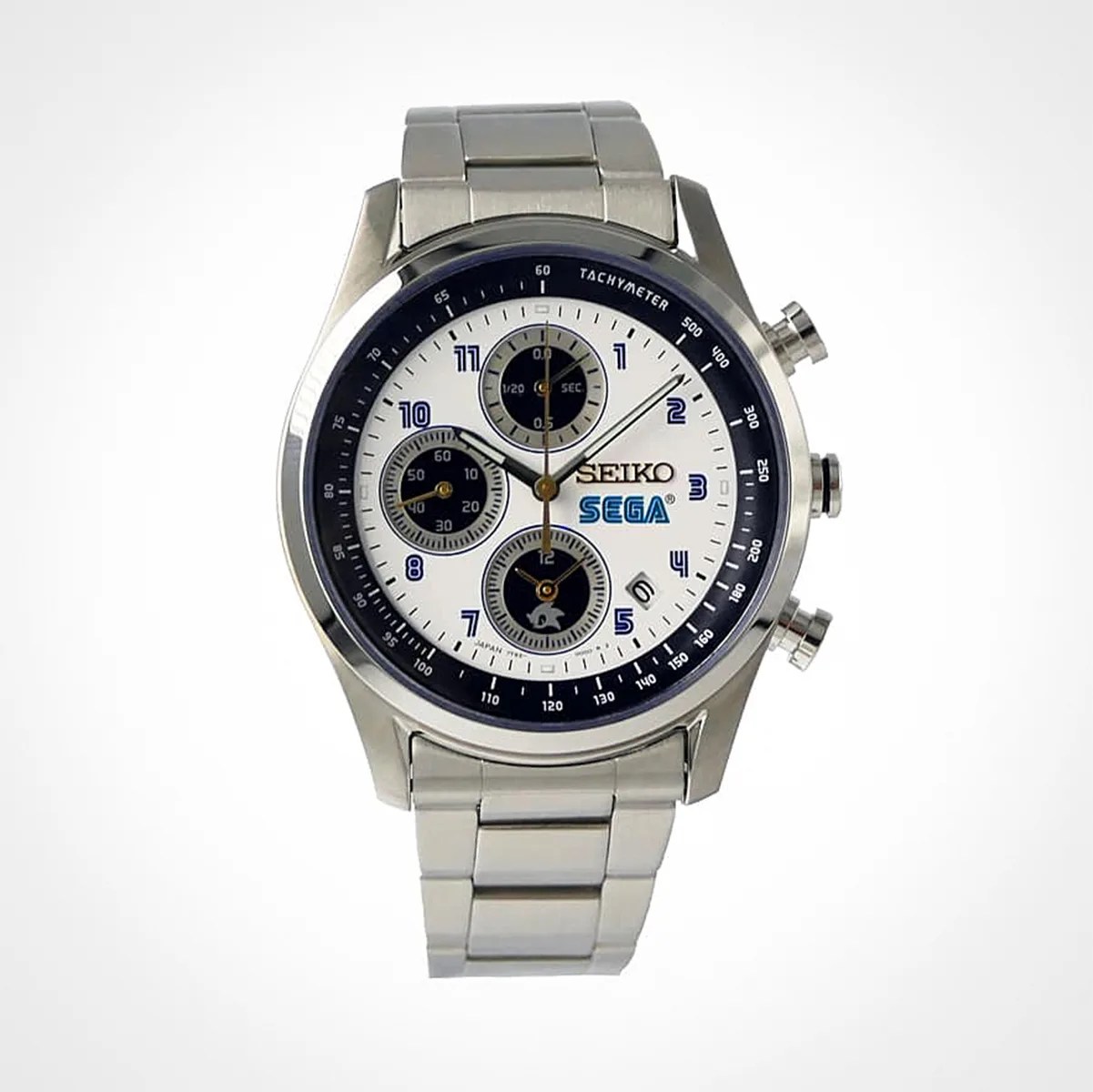 Silver Seiko wristwatch with white dial, blue accents, three subdials, and SEGA logo on the face.
