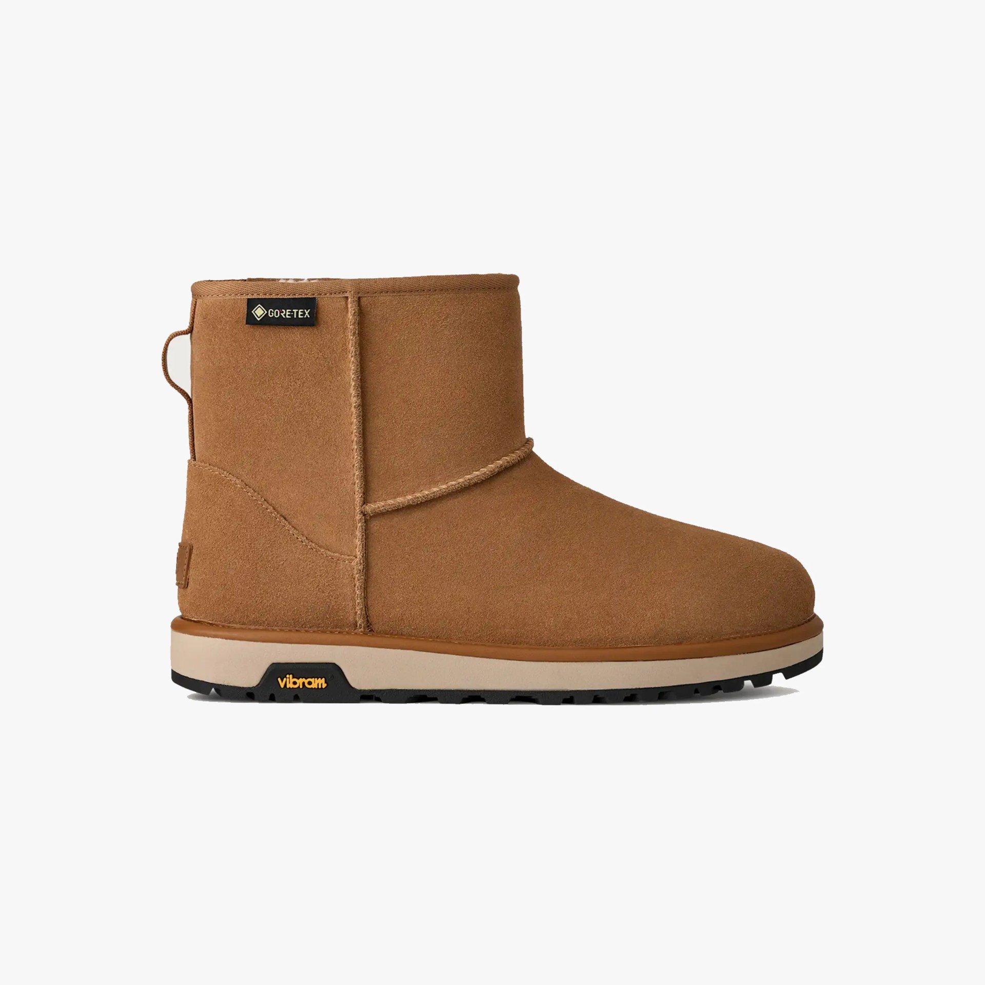 Chestnut brown suede ankle boot with Vibram sole and Gore-Tex label on a white background.